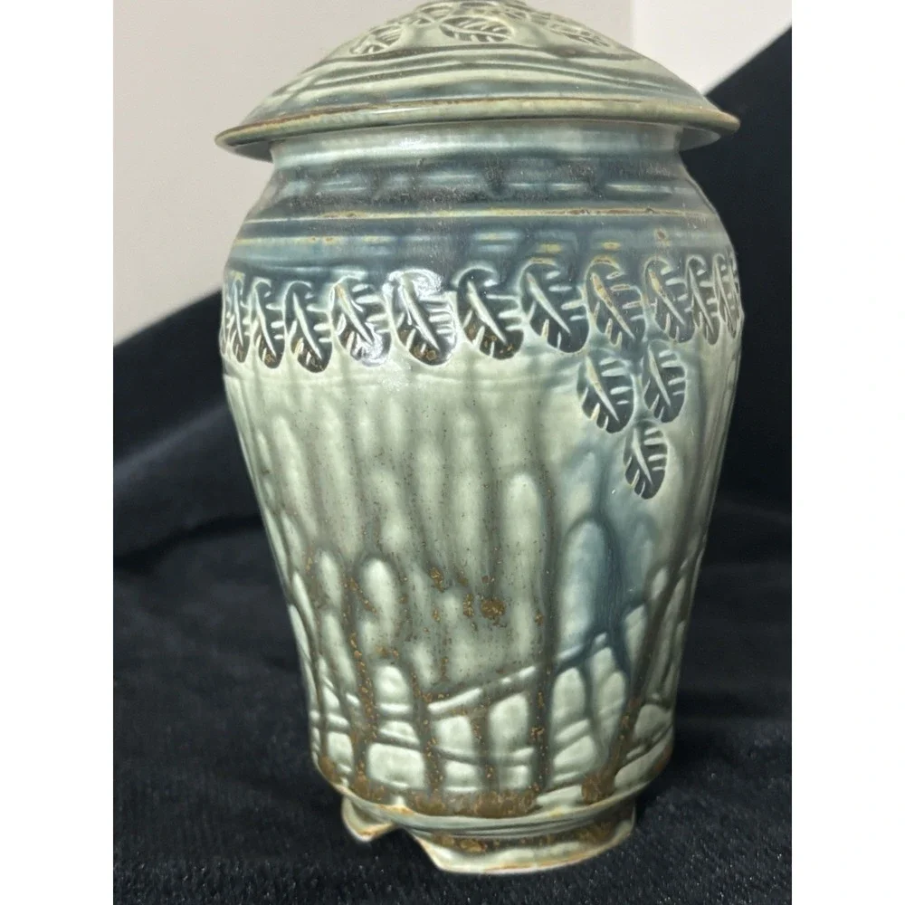 North Carolina Pottery With A Lid. Blue And Sage With A Leaf Motif